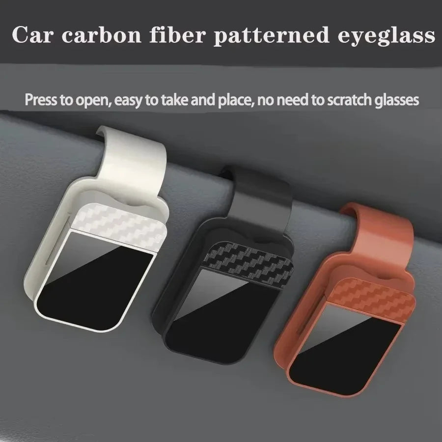 The Visor Clip That Keeps Your Sunglasses From Sliding Under the Seat