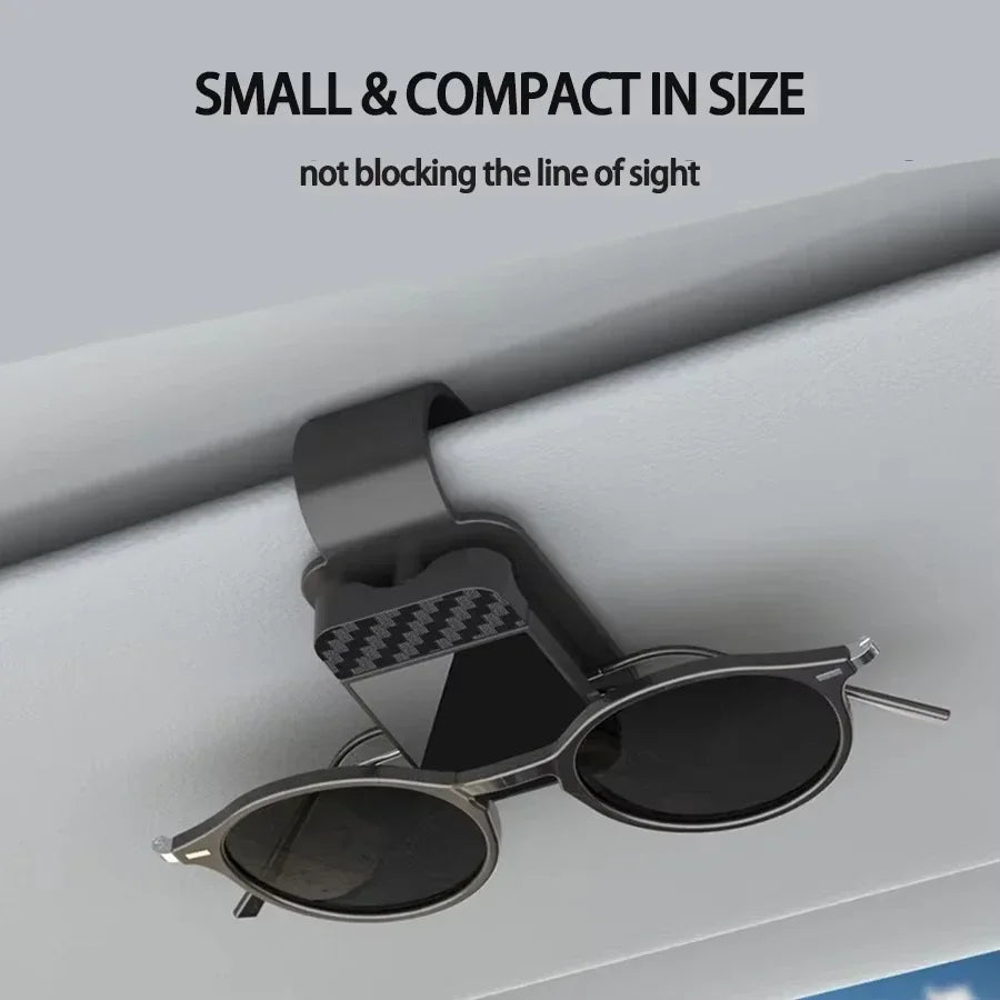 The Visor Clip That Keeps Your Sunglasses From Sliding Under the Seat