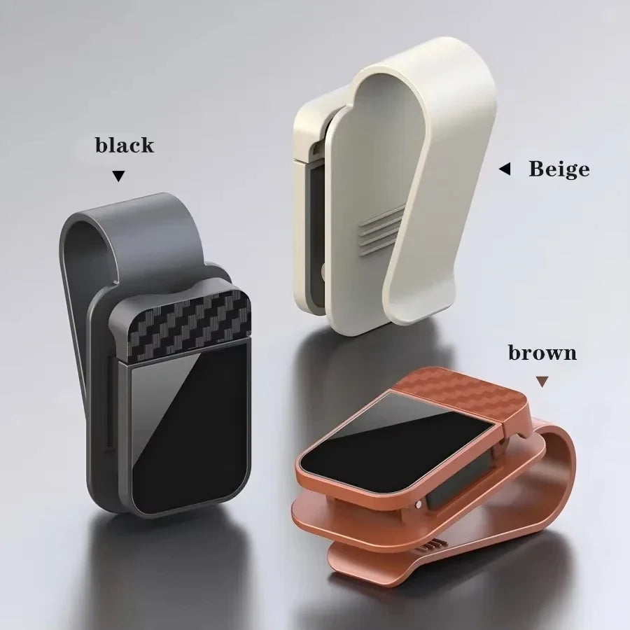 The Visor Clip That Keeps Your Sunglasses From Sliding Under the Seat
